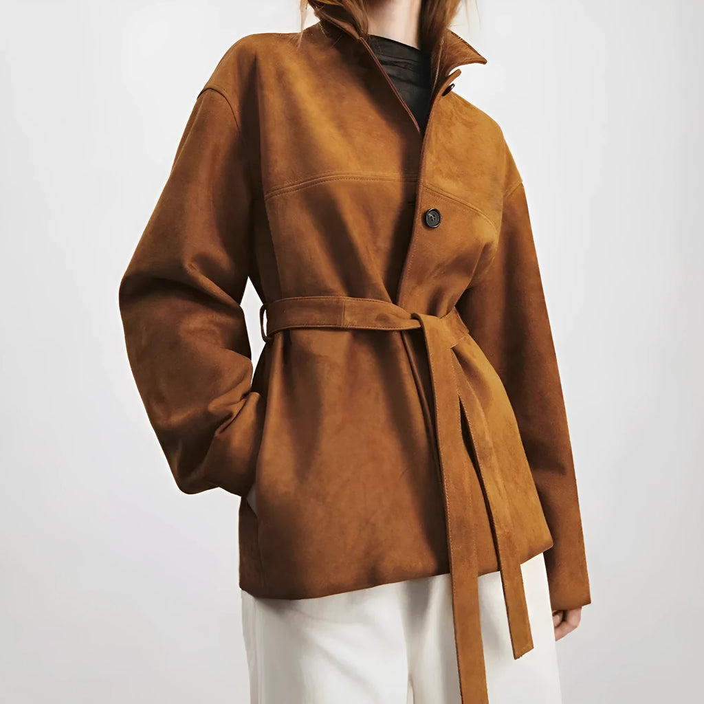 Yellow brown loose-fit cashmere coat with a leather-stitched Peter Pan collar and an attached waist belt.