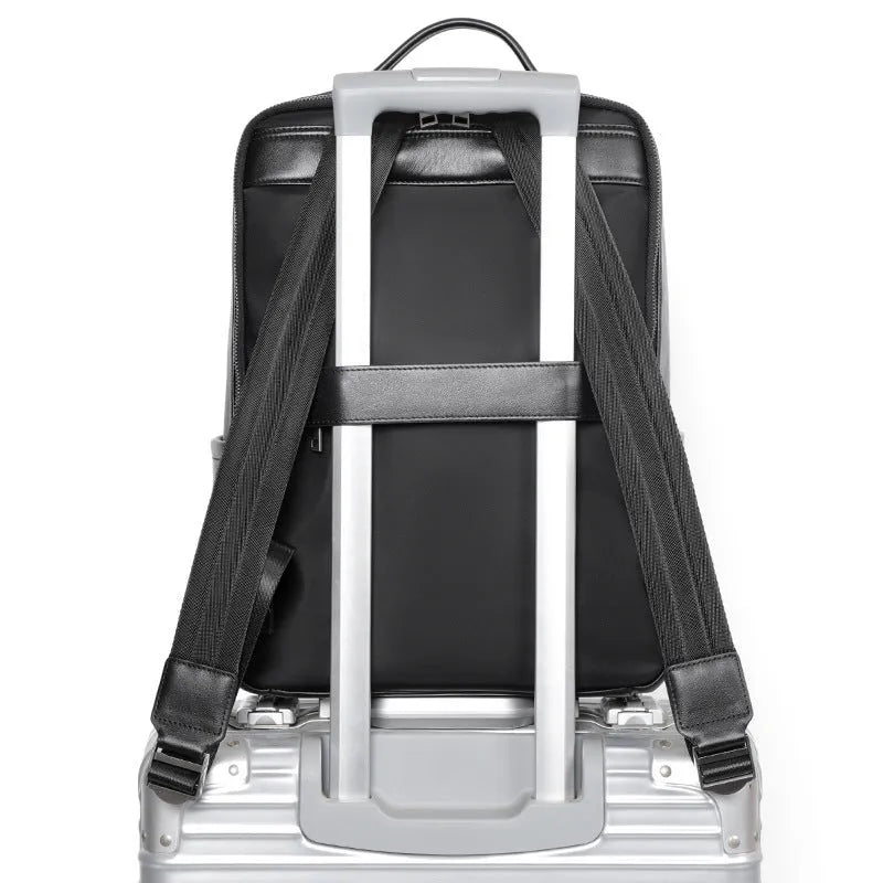 Men's black leather computer backpack with woven design and large capacity