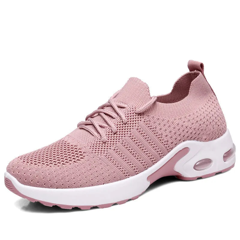Women's lace-up casual sneaker in grey mesh with a round toe and soft PVC sole.