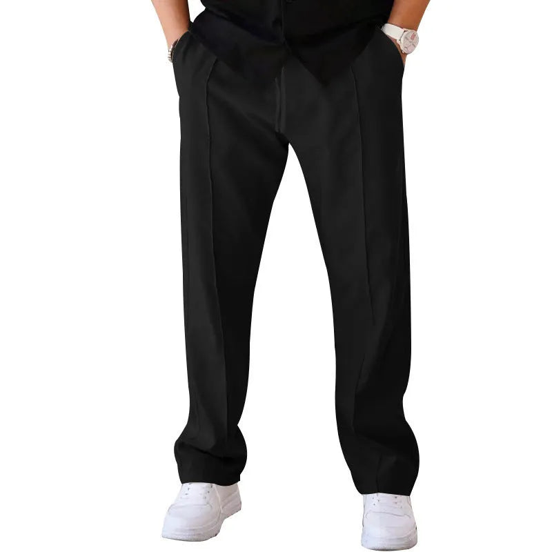 Men's loose straight trousers in waffle polyester with drawstring, available in multiple colours including black and light grey