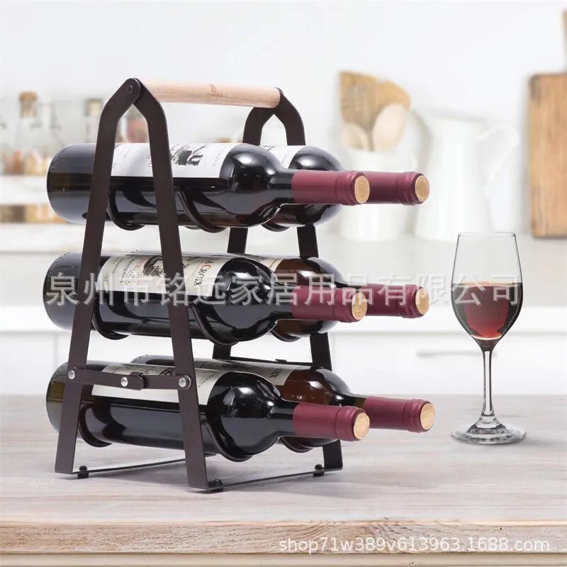 Iron desktop wine rack black with two wine bottles on kitchen countertop