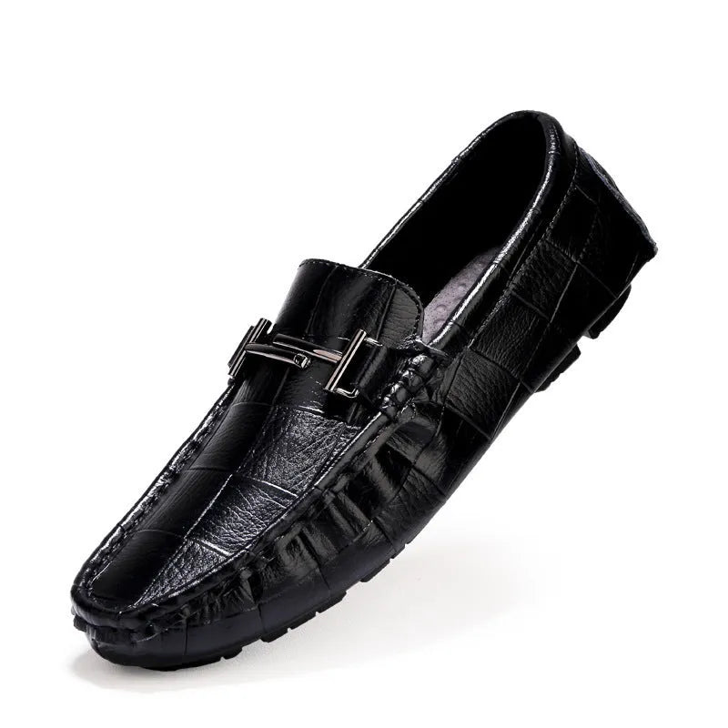 Men's casual leather shoe with a belt buckle on the upper, shown in one of four available colours.