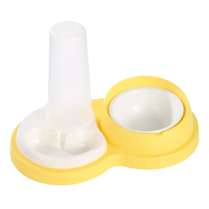 Grey and yellow double pet feeding bowl with ceramic food bowls and stainless steel water dish on a PP plastic base.