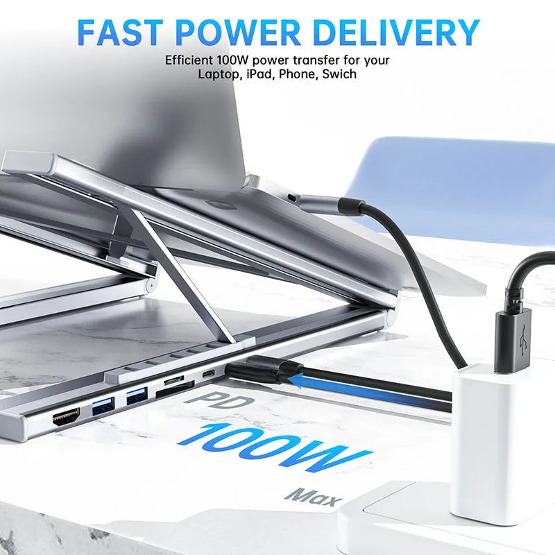 Aluminium folding laptop stand with built-in 8-in-1 USB-C and HDMI docking station ports.