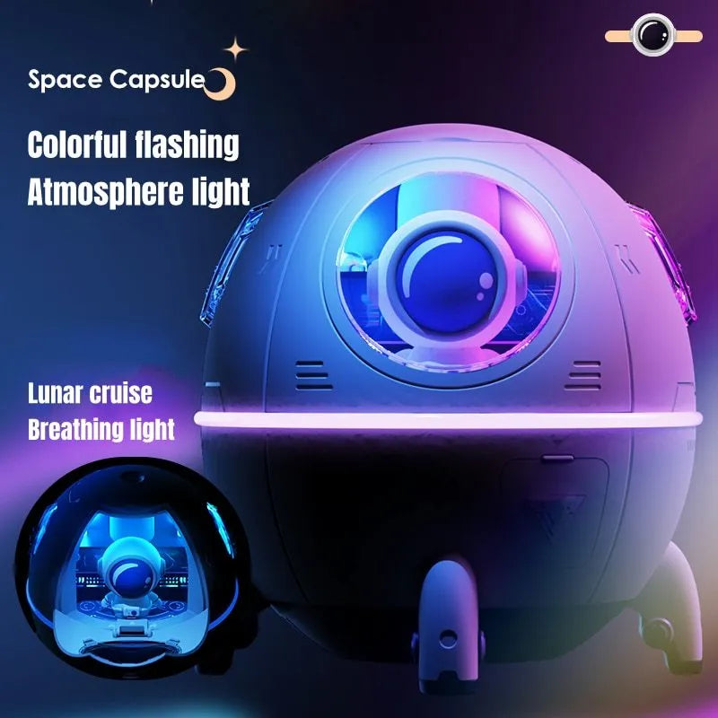 Purple astronaut-shaped USB desktop humidifier with colourful LED light on