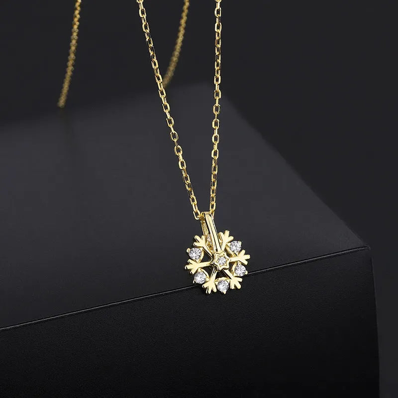 Pure silver rotating snowflake necklace with electroplated finish on adjustable cross chain for women