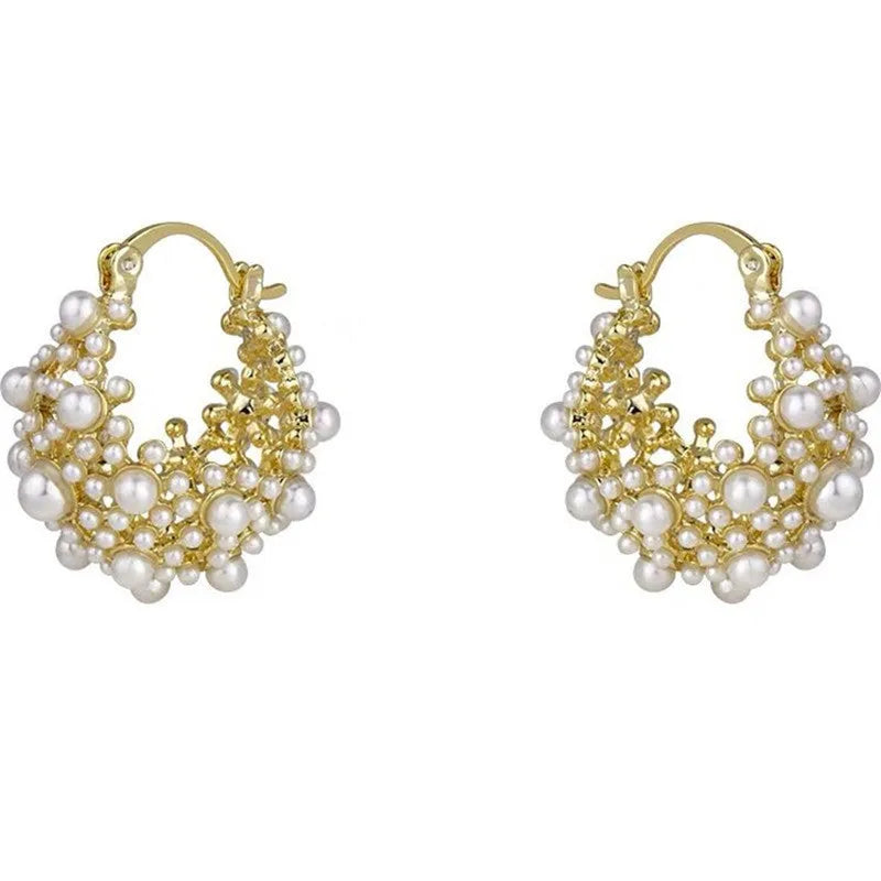 Gold tone women's flower basket earrings with small rice-shaped beads and pearl inlay detail