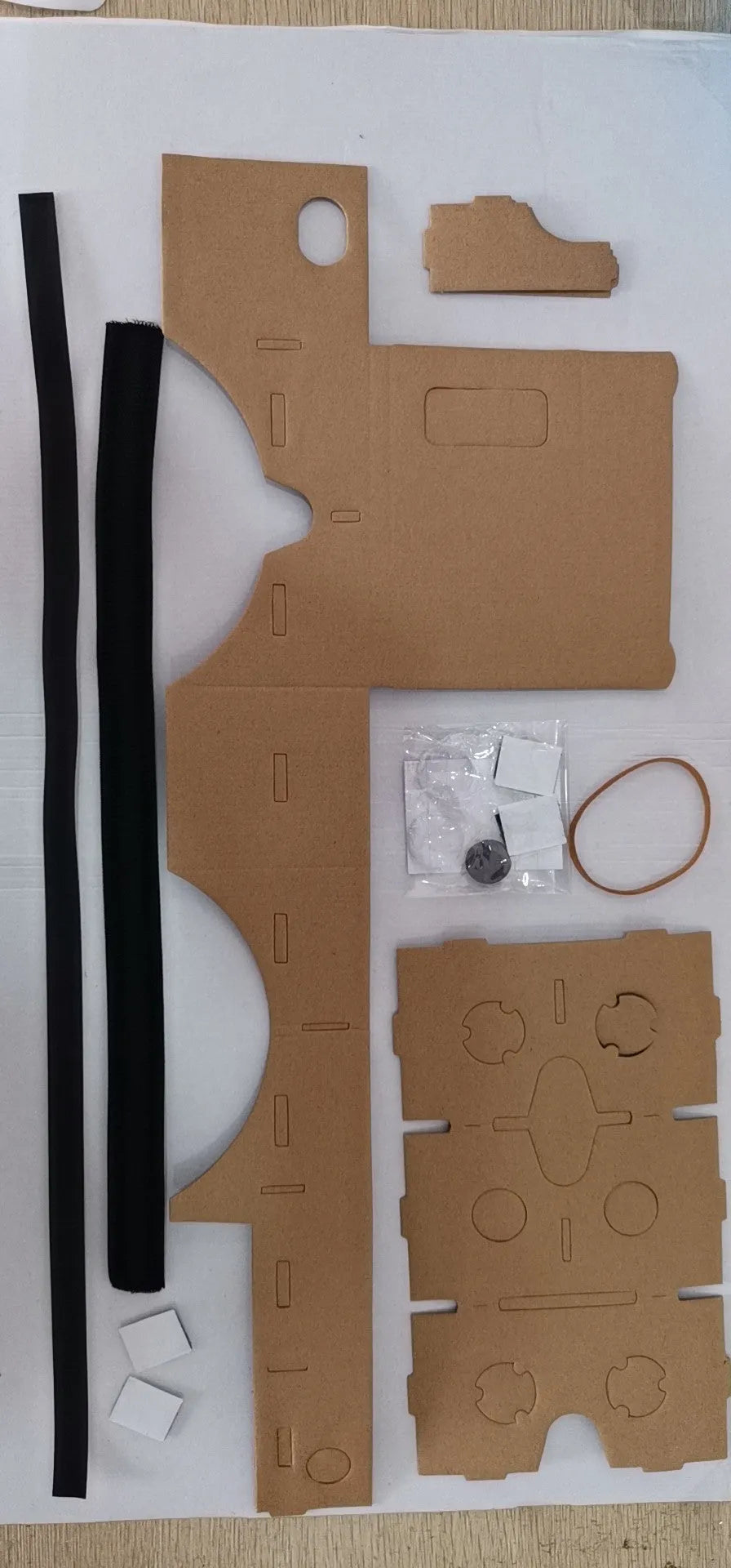 Pink and white cardboard VR glasses headset for smartphones up to 6 inches.