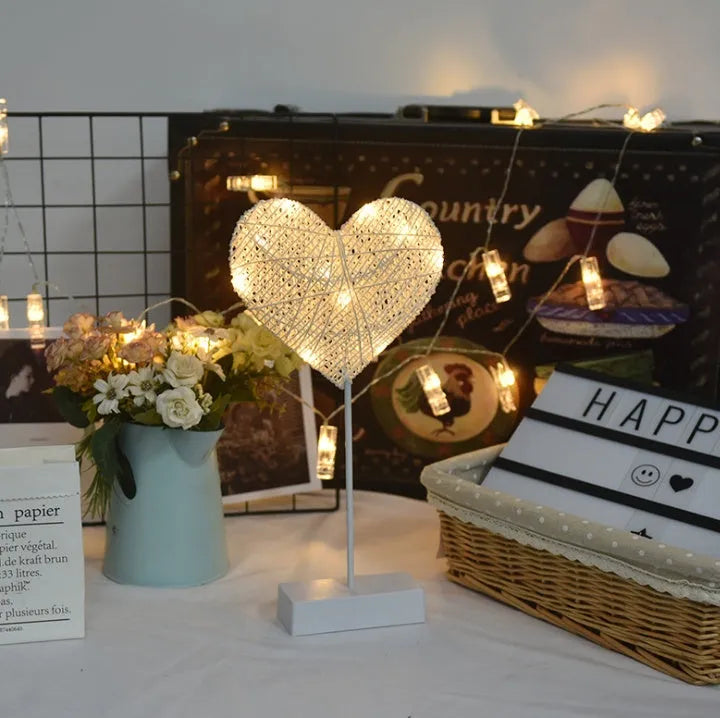 Rattan and PC LED star, heart, and moon shaped battery operated decorative lamps.