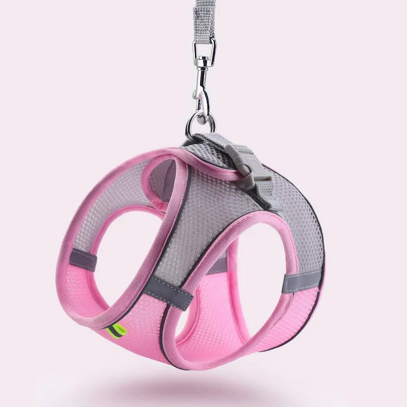 Reflective vest-style dog harness in breathable polyester with adjustable straps and rope leash
