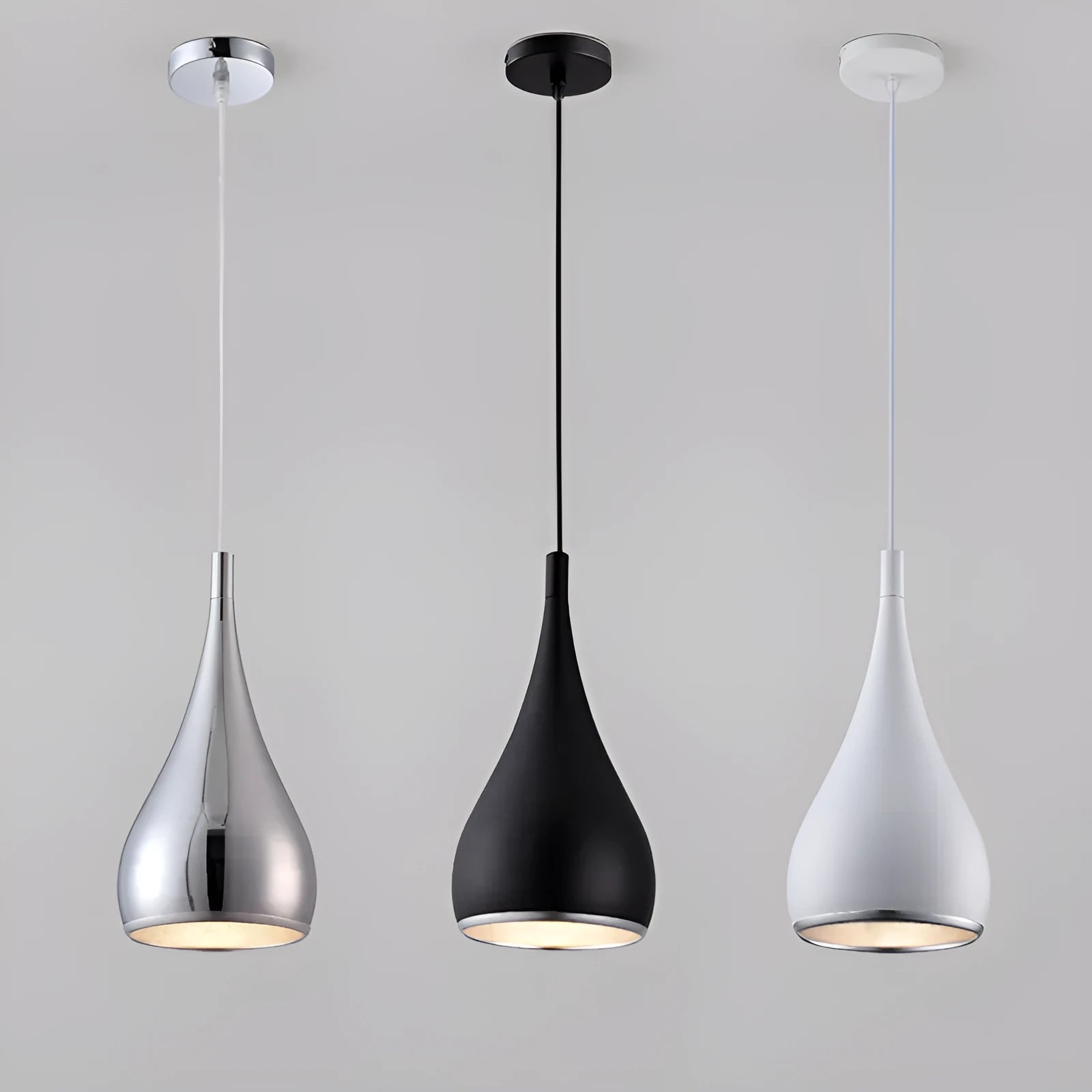 Iron minimalist chandelier lamp in black finish with three-head disc configuration for ceiling mounting