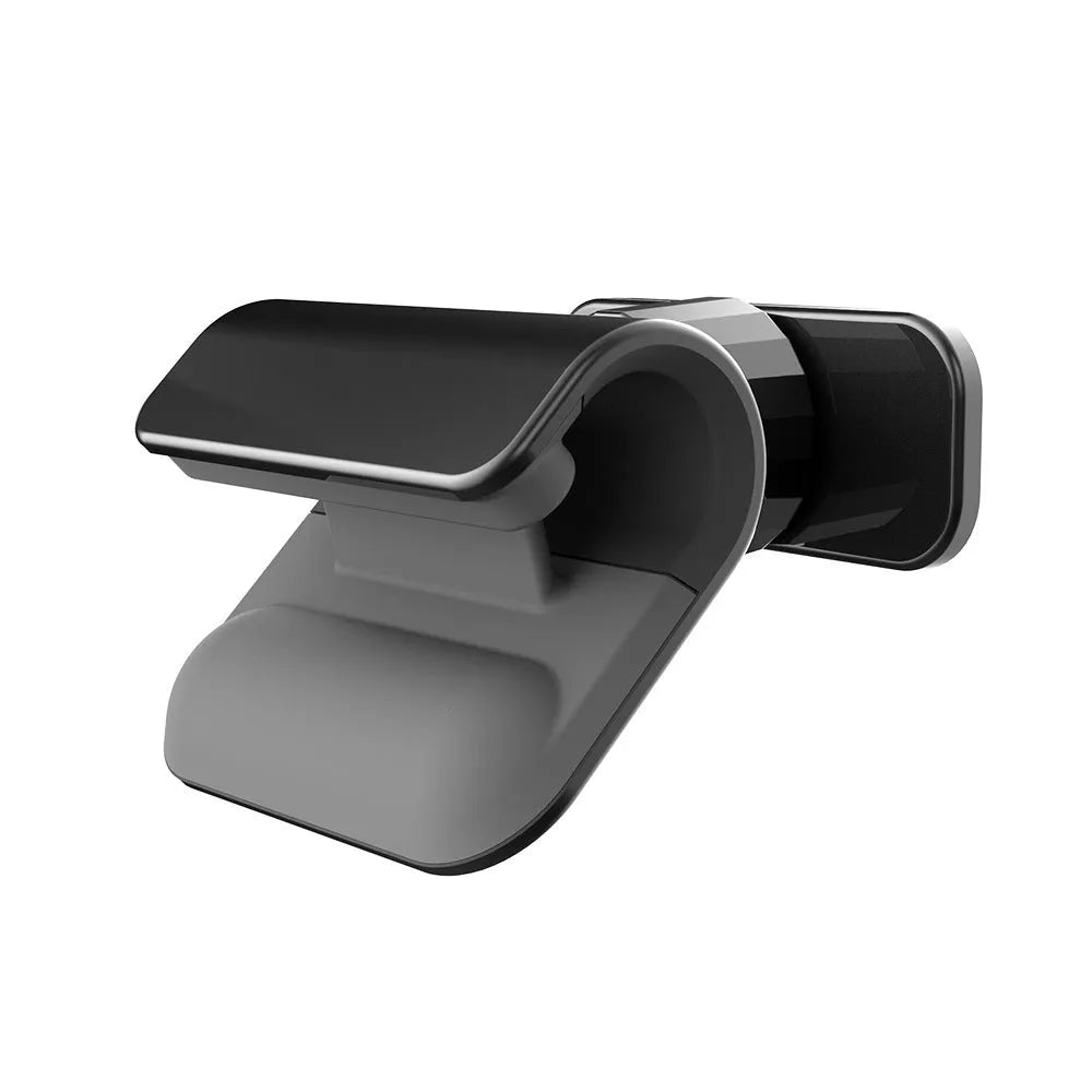 Black car phone holder with 360-degree rotation mounted on vehicle dashboard holding smartphone