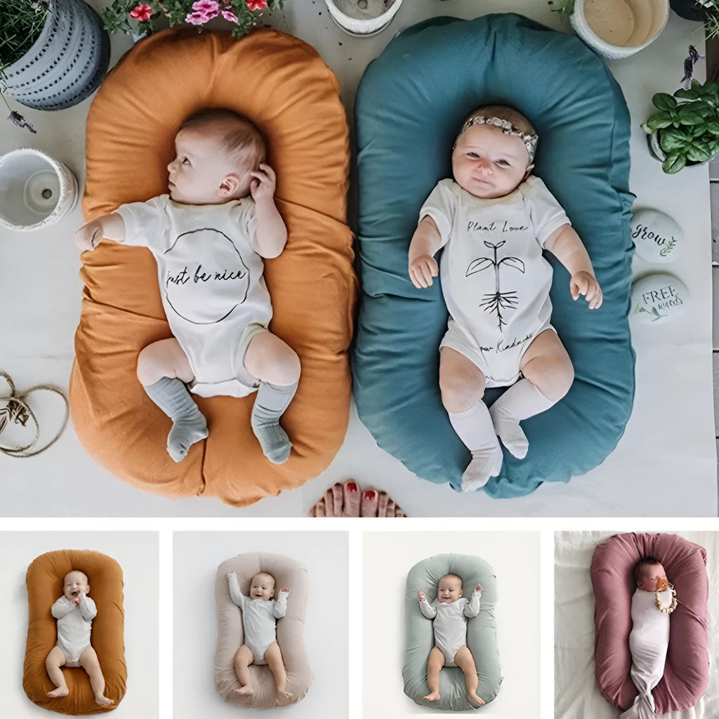 Beige portable cotton baby nest crib for infants measuring 75cm by 45cm
