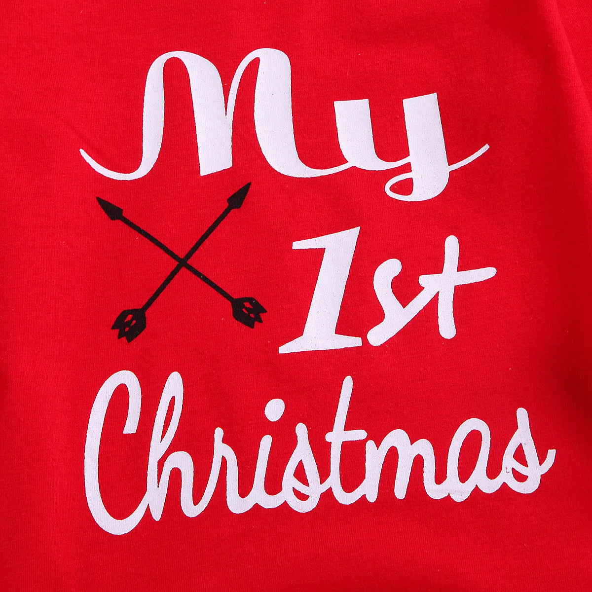 Girls' red Christmas suit with cartoon print top and trousers on white background