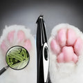 Black pet hair clippers with ceramic blade, ABS plastic body, USB charging, and 300mA current rating