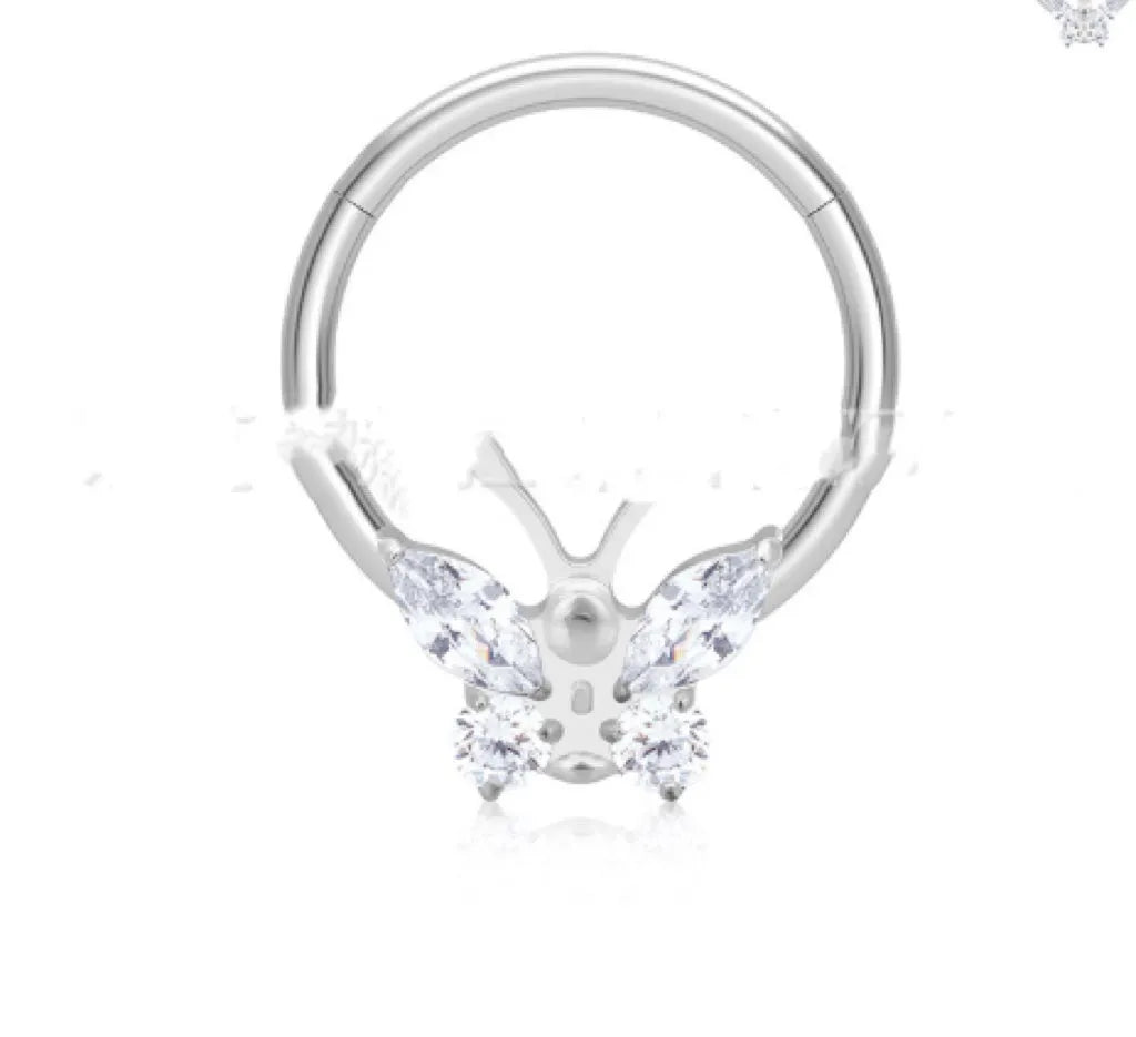 Titanium alloy labret nose ring with inlaid butterfly zircon on a closed ring stud, gold white colour, unisex bow shape