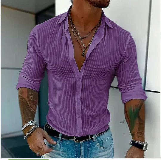 A man's loose-fit striped cardigan shirt with long sleeves in a British style design.