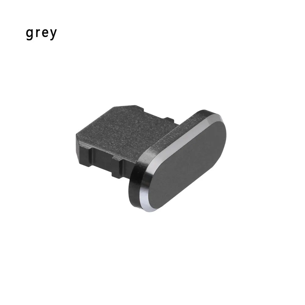 Aluminium alloy iPhone charging port dust plug in multiple colours including gold, silver, blue, red, grey, black, and rose gold.