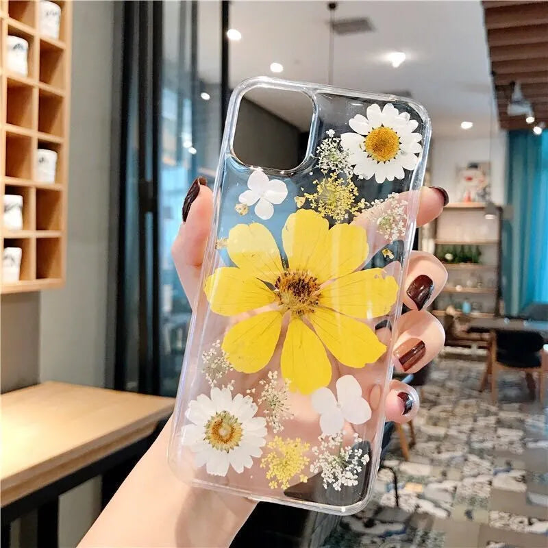 Floral iPhone case with large flower design on flexible TPU back cover in pink or yellow colour options