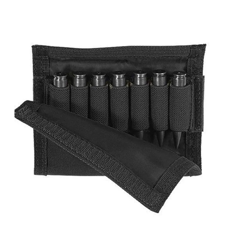 Tactical cheek rest with black nylon surface, hook and loop straps, and removable ammo carrier attached to a rifle stock