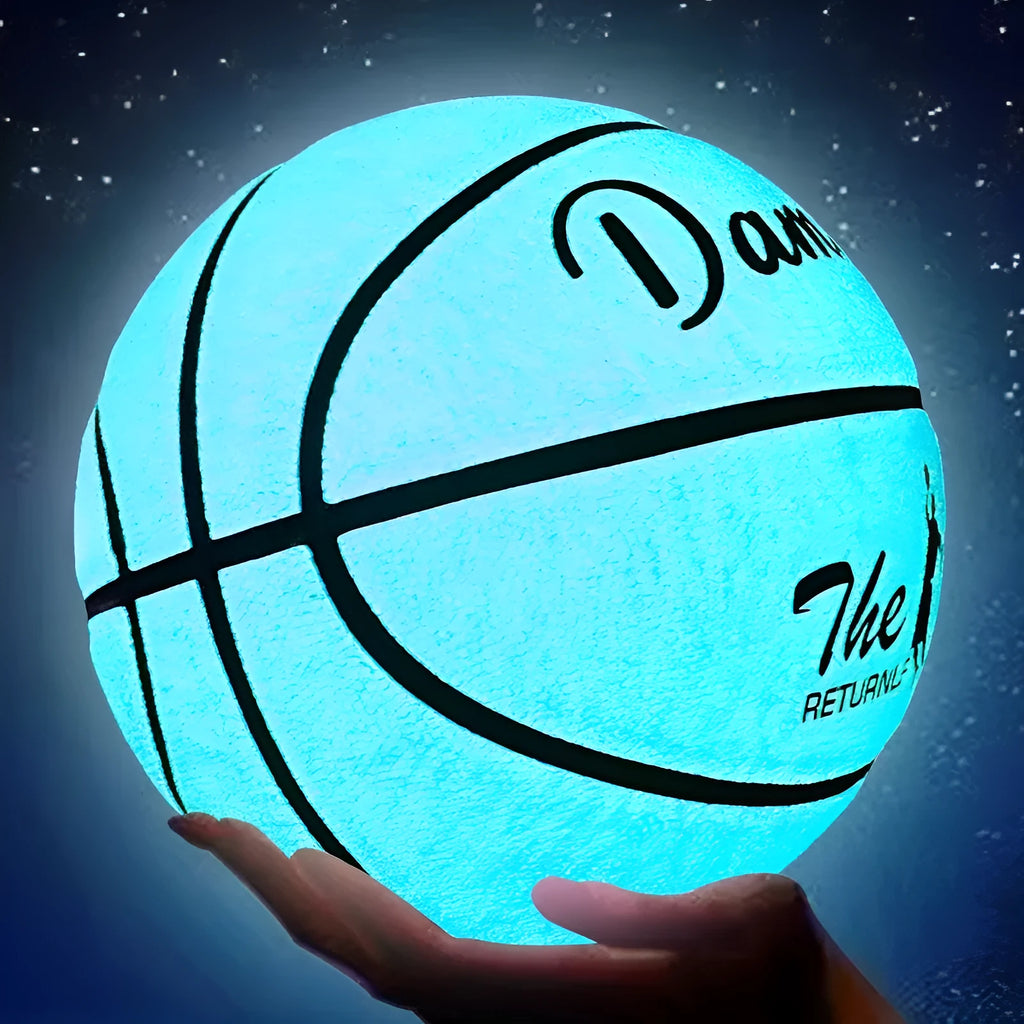 Luminous outdoor basketball with soft PU leather cover in glowing blue colour on outdoor court