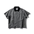 Grey loose-fit short-sleeved cardigan-style overalls shirt on a hanger.