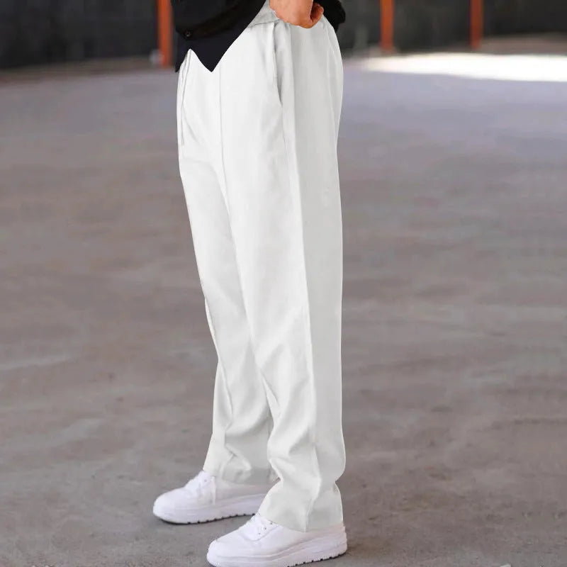 Men's loose straight trousers in waffle polyester with drawstring, available in multiple colours including black and light grey