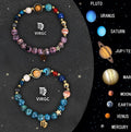 Two natural stone beaded bracelets with metal zodiac charms, showing Aries and Libra symbols, on a wrist.