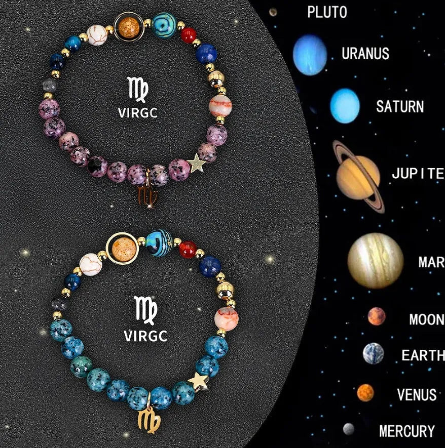 Two natural stone beaded bracelets with metal zodiac charms, showing Aries and Libra symbols, on a wrist.
