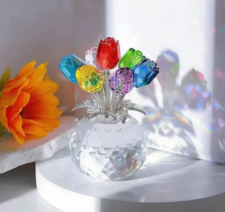 Handcrafted geometric rose ornament made from coloured K9 crystal glass on a neutral background.