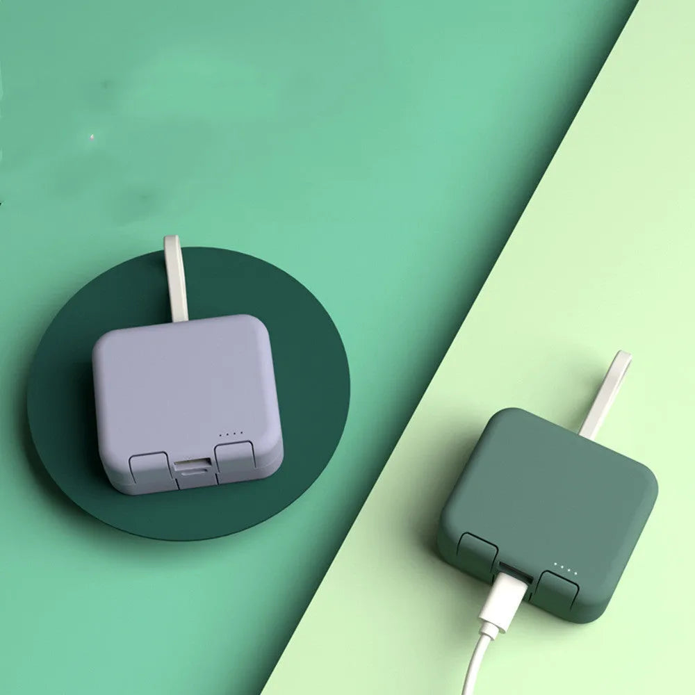 Handbag back clip power bank in blue, showing clip and dual USB charging ports