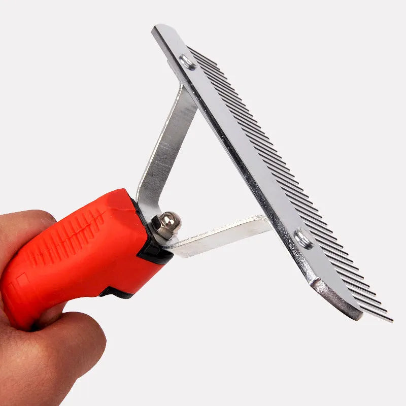 Large red dog comb with rubber handle and metal teeth for pet grooming
