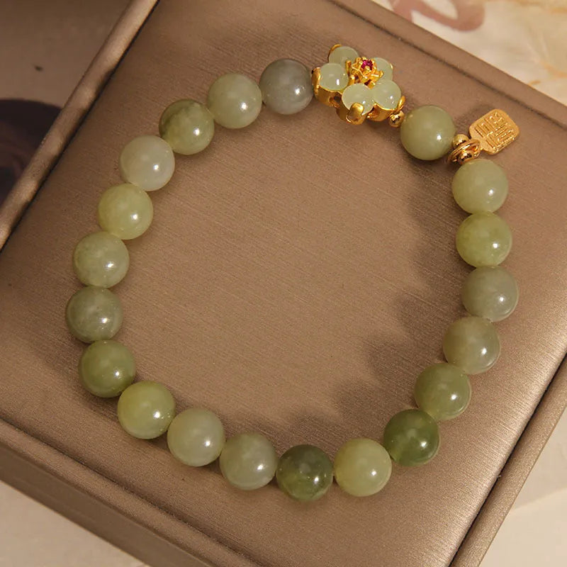 Women's alloy bracelet in grey jade colour with clasp closure for casual wear.