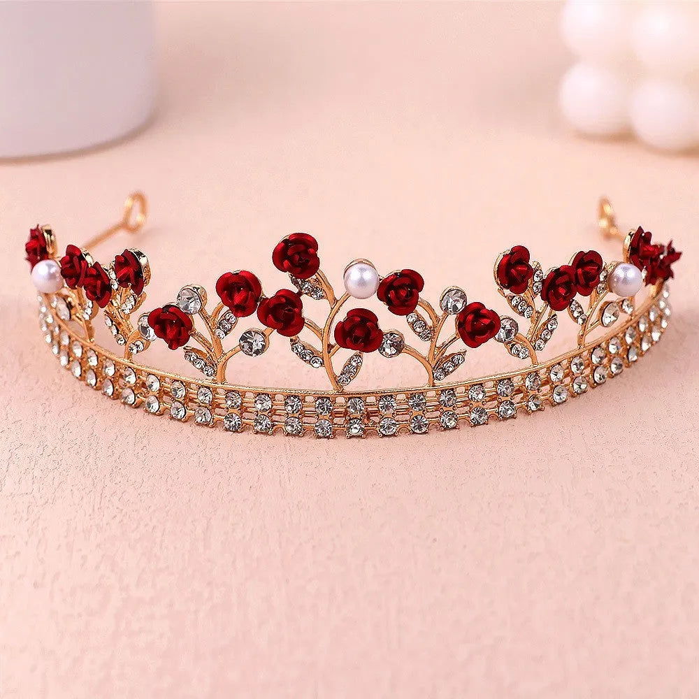 Gold alloy crown-shaped wedding hair headdress with electroplated finish on neutral background