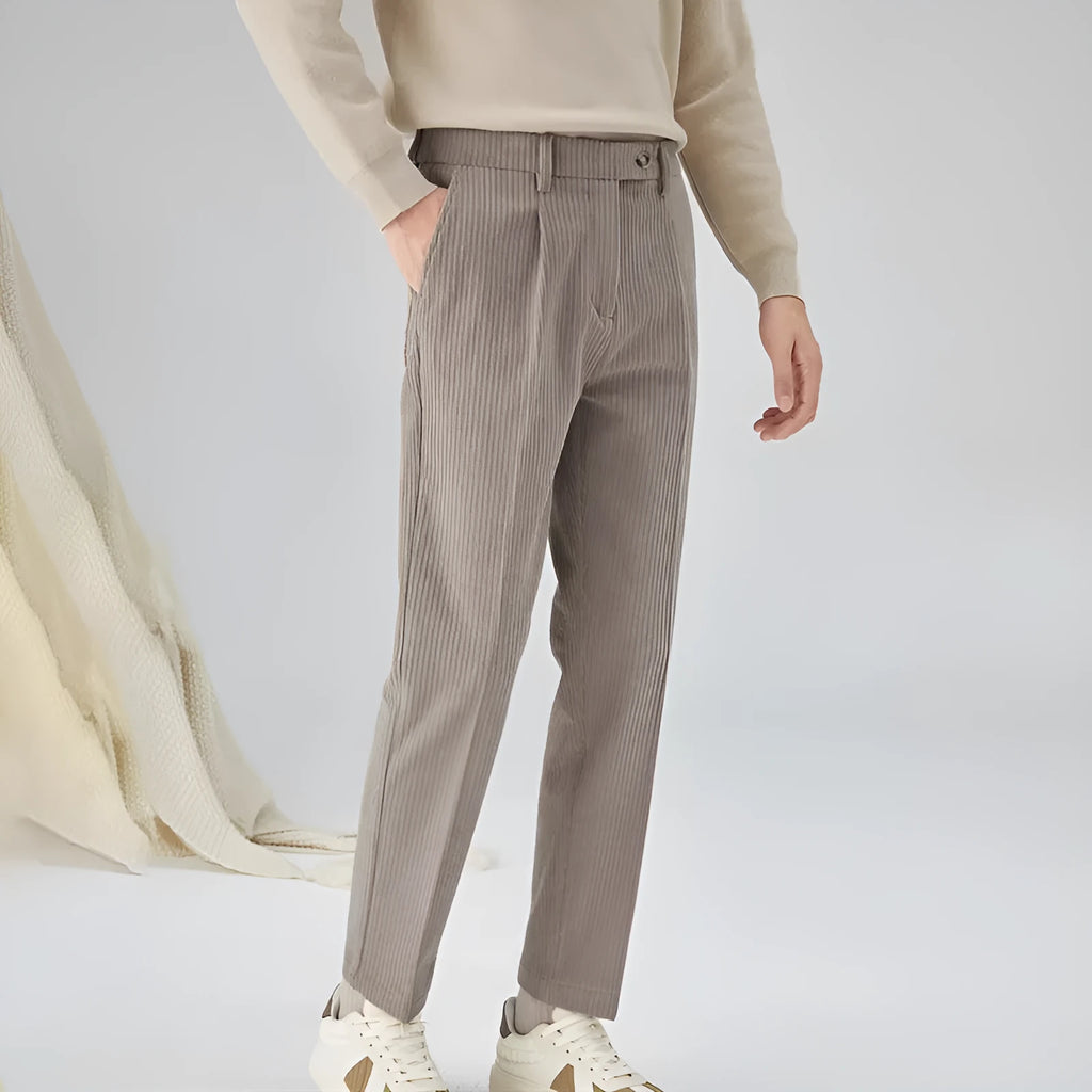 Men's straight-leg corduroy trousers in black, beige, and brown grey colours showing loose fit and textured fabric