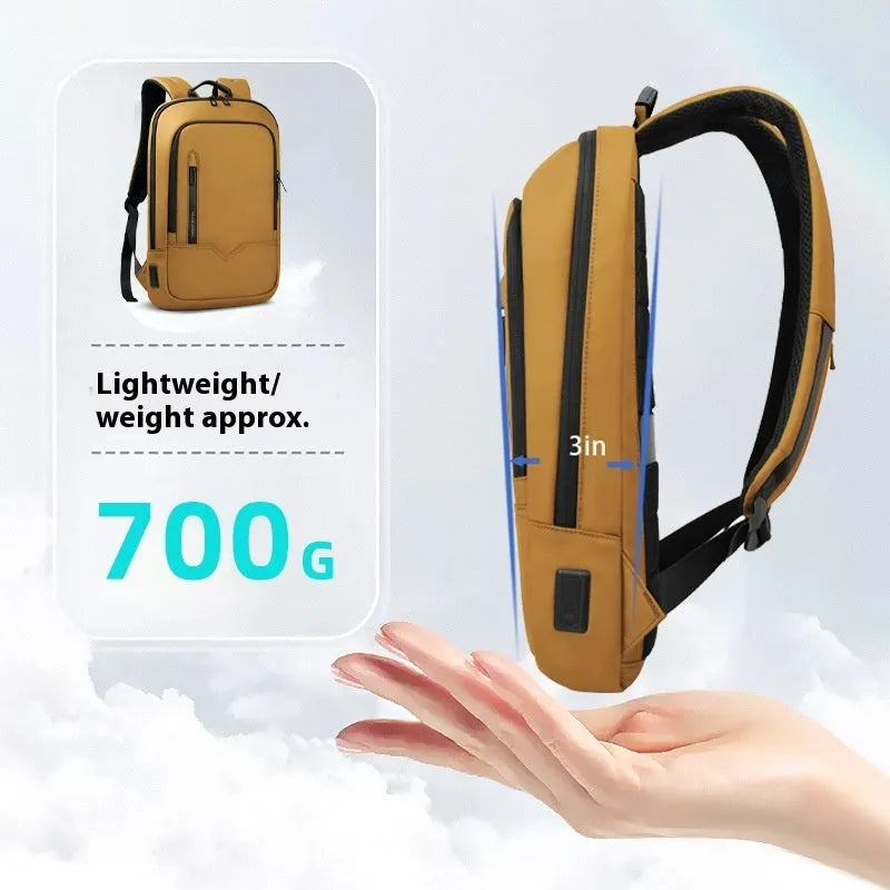 Lightweight solid colour polyester backpack with USB charging port for a laptop.