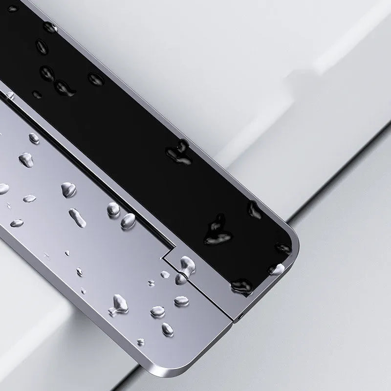 Invisible paste foldable computer stand in grey aluminum alloy, 227mm long, 3mm thick, folded flat on desk