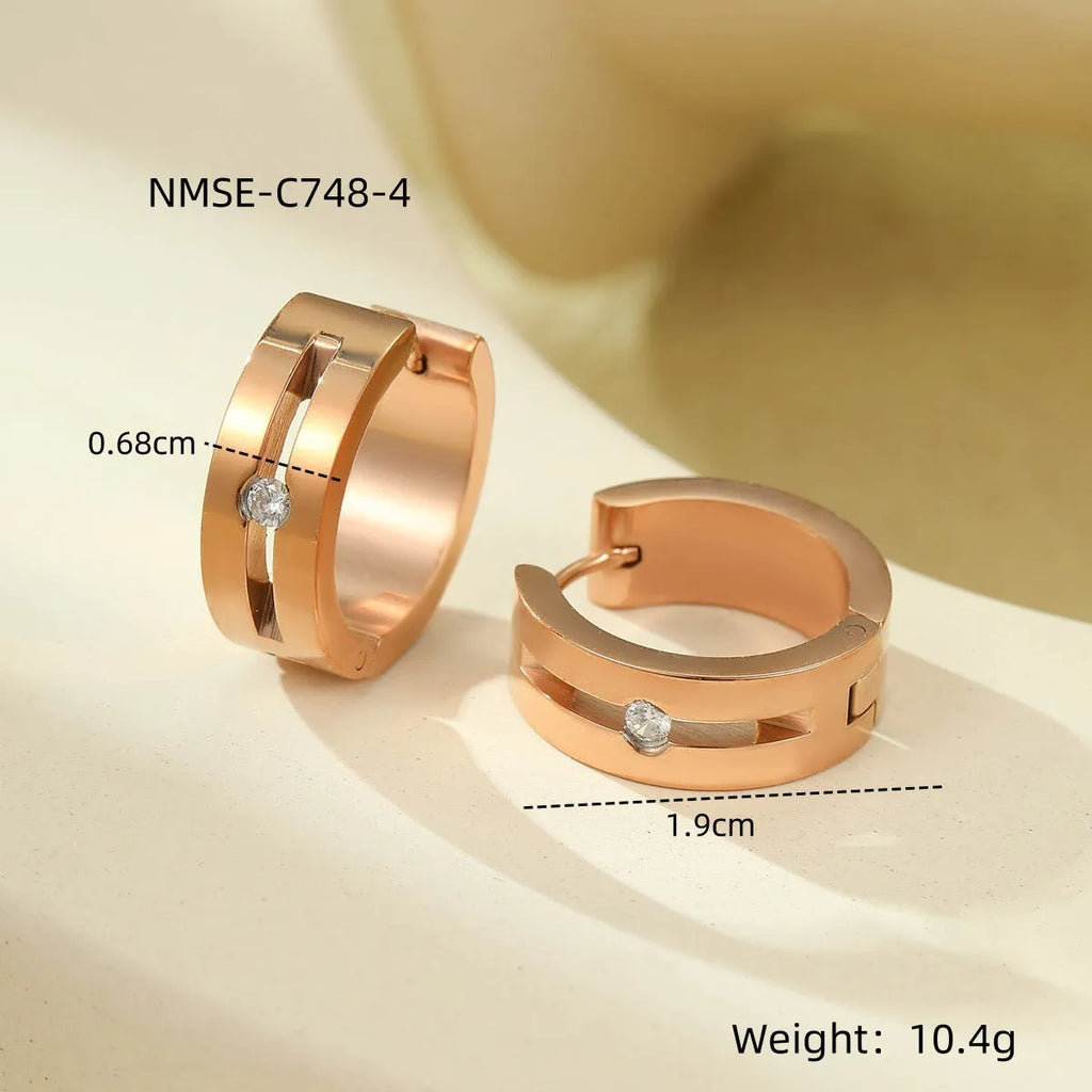 Pair of geometric diamond ear clips in 18K electroplated stainless steel, shown in gold, colour matching, and rose gold options