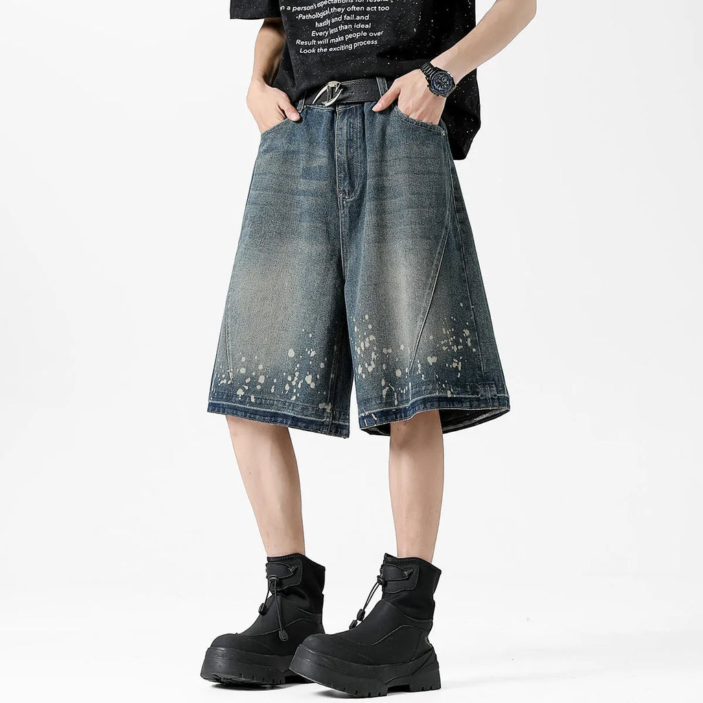 Men's retro blue denim shorts with ripped splash ink design, straight cut fifth-length