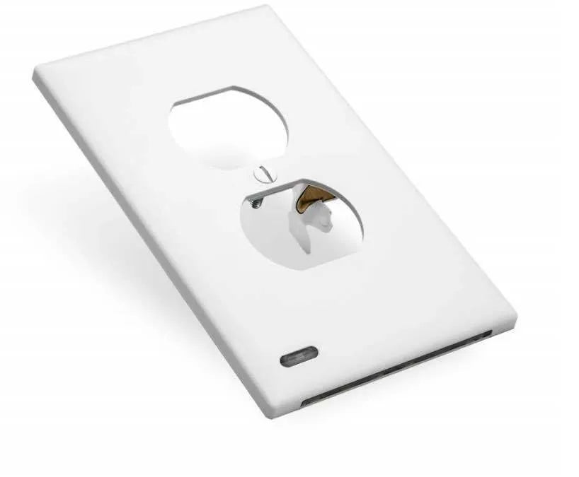 White plug-in socket induction night light installed in a UK wall socket, showing a soft glow from the integrated LEDs.