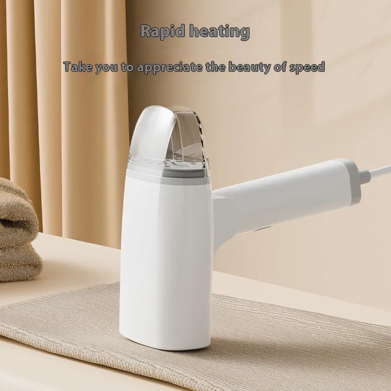 Blue handheld garment steamer with water tank and temperature controls