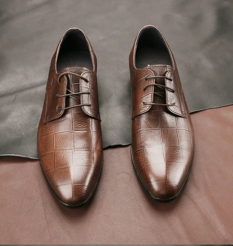 Men's black checkered derby leather shoes with a pointed toe and rubber sole.