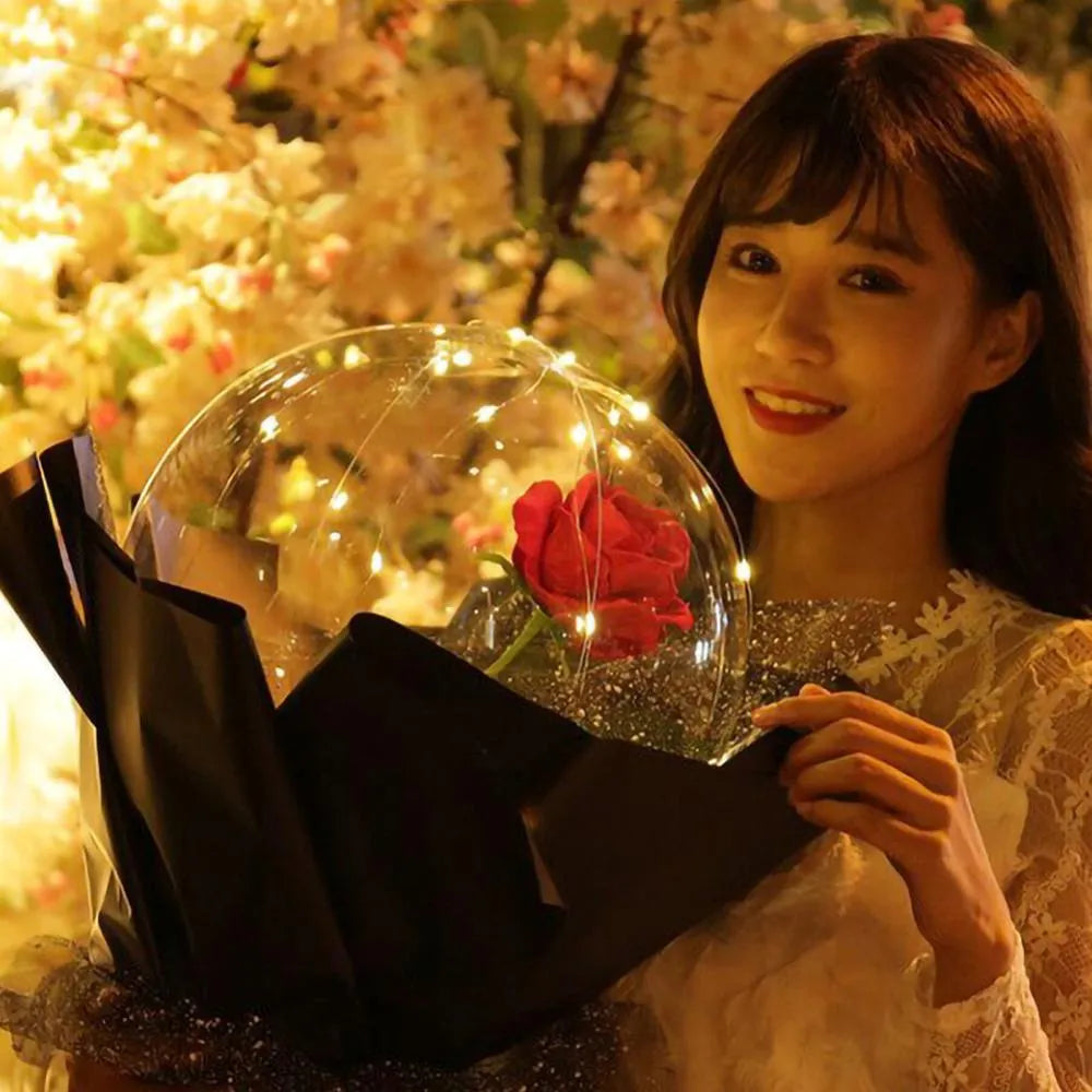 Transparent LED luminous balloon with artificial rose inside glowing with built-in light