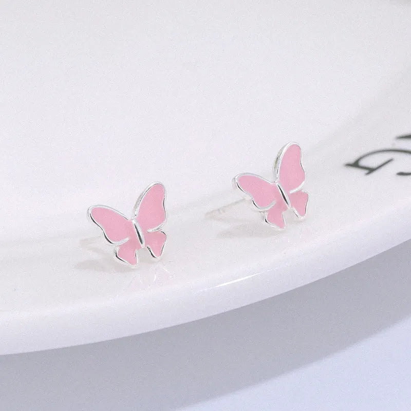 Side view of 925 silver butterfly stud earrings with geometric shape and plating finish