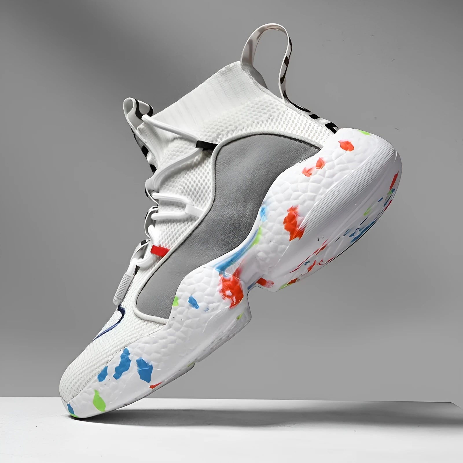 Men's camouflage pattern sneakers with mesh upper and rubber sole in black or white.