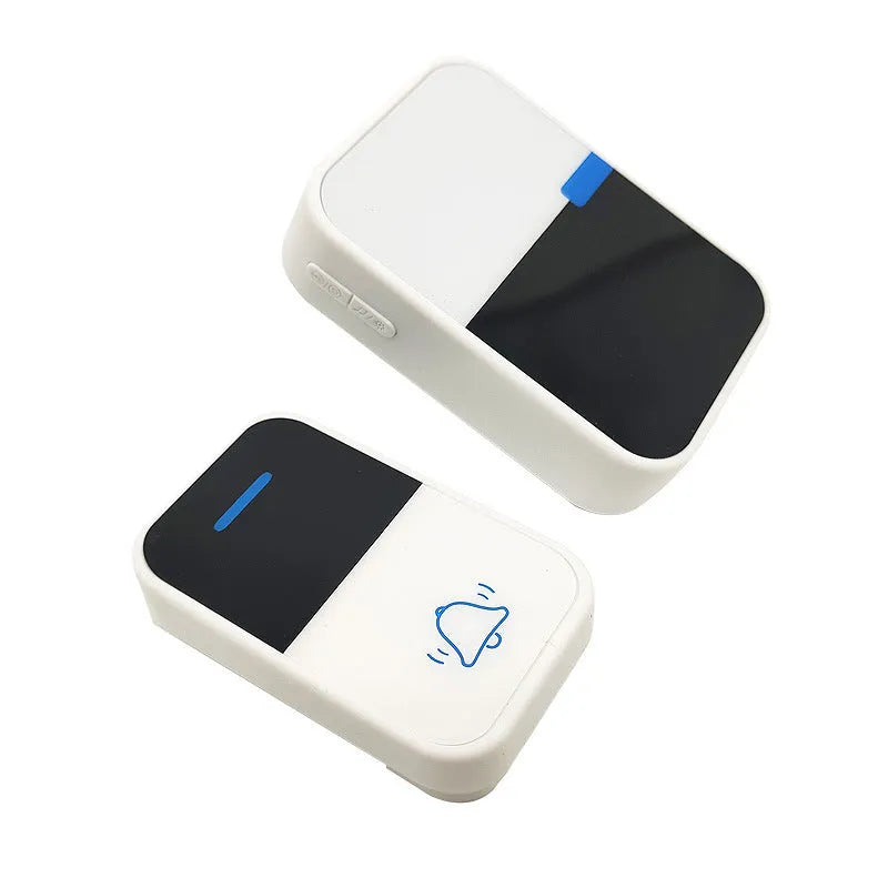 White plastic self-generating wireless doorbell kit with separate button and receiver units.