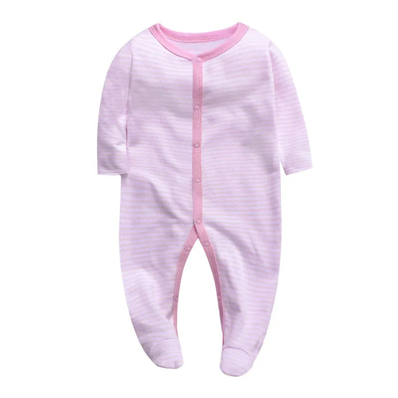 Soft cotton baby one-piece bodysuit in blue and green dinosaur print, size 6M, front view on white background