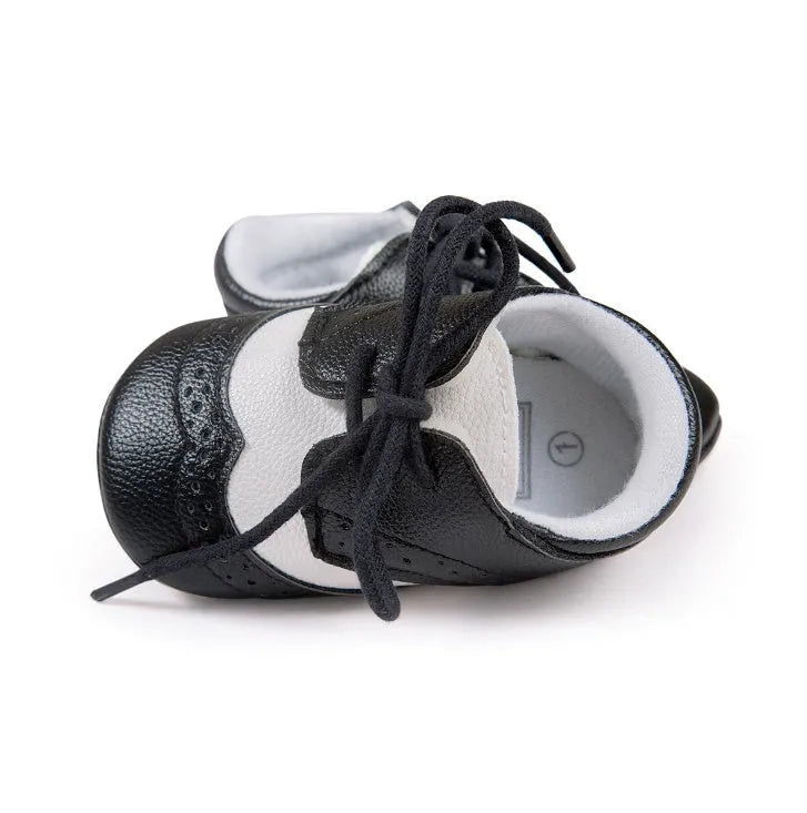 Men's vintage-style baby walking shoes in synthetic leather, shown in light brown colour.
