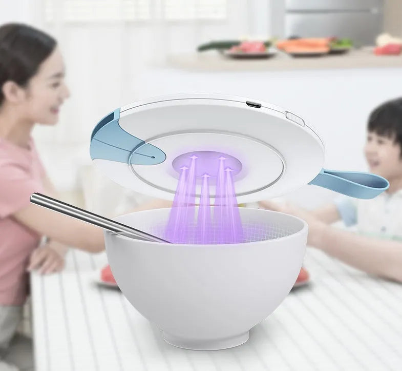 Blue portable UV baby bottle steriliser with USB charging port and compact dimensions