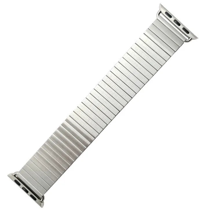 Silver stainless steel elastic Apple Watch band on a wrist, compatible with 38mm to 44mm cases